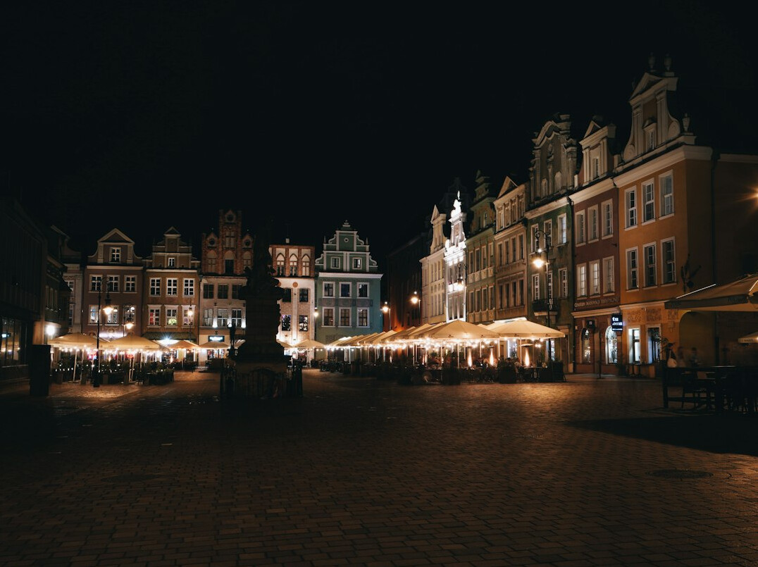 Empty cobblestone market square in a Polish old town at dawn